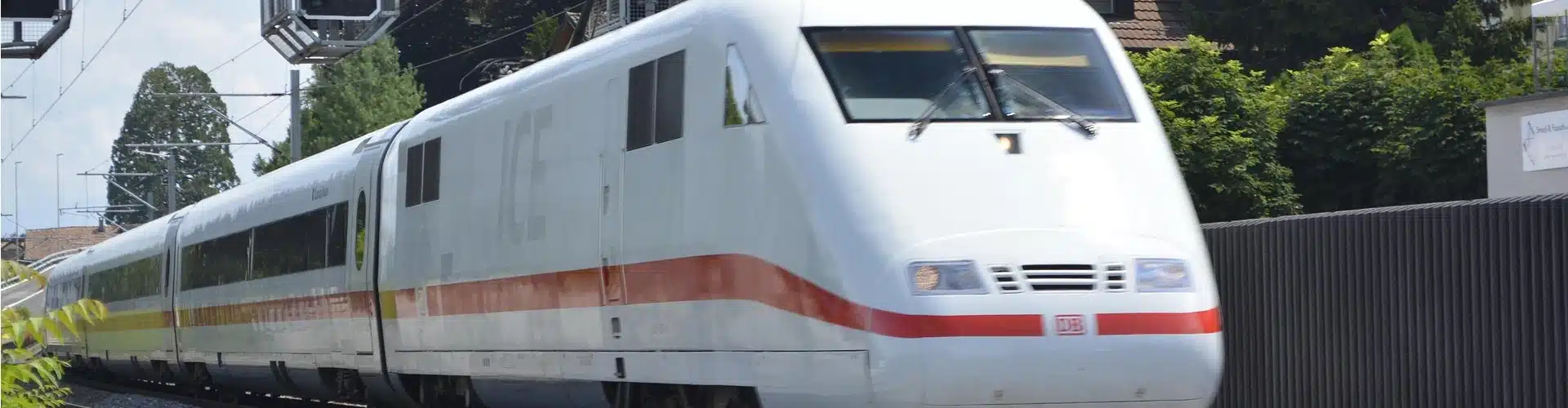 a white train with red stripe